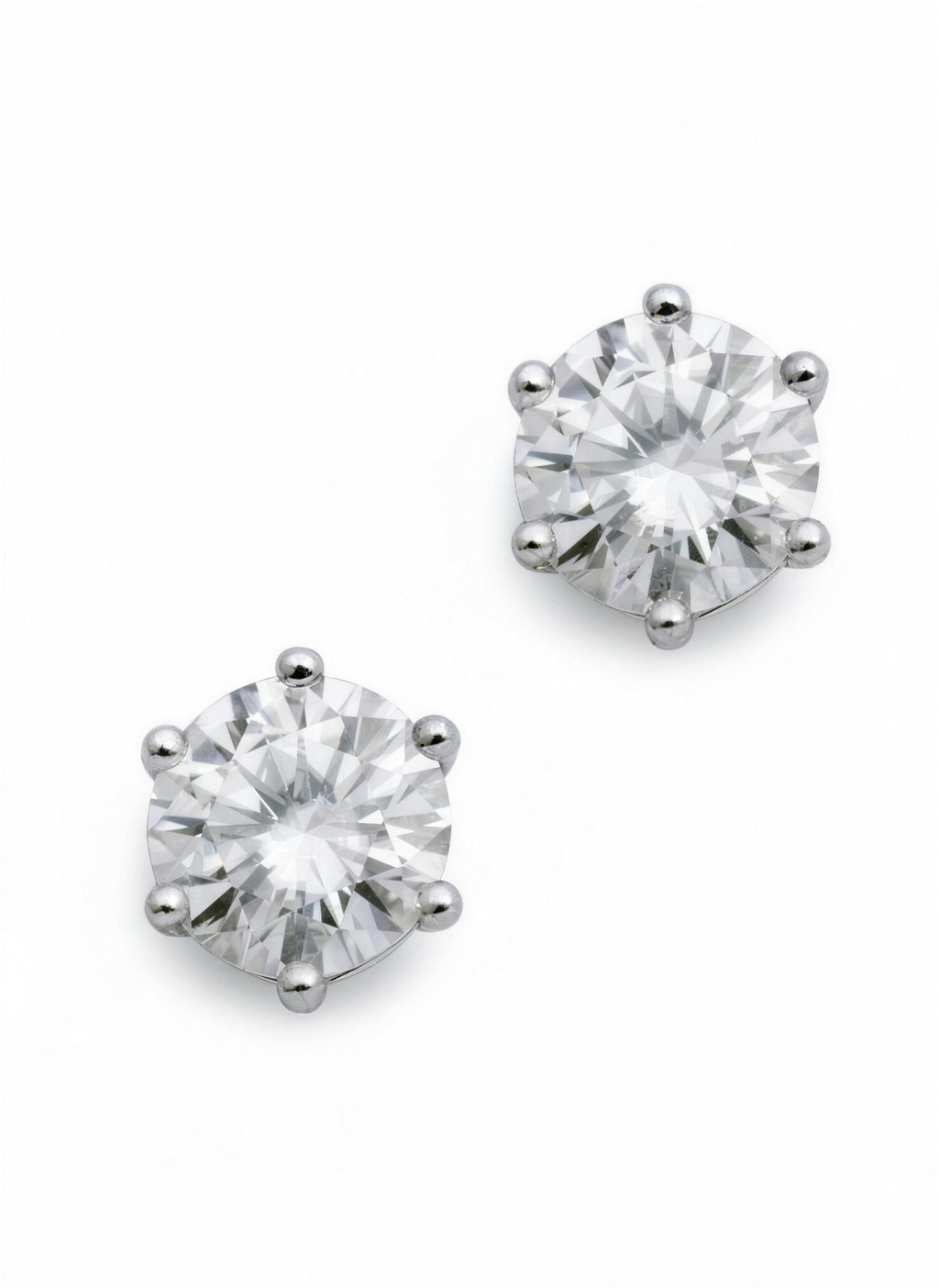 H. Moissan Studs – round moissanite solitaire stud earrings in a six-prong white setting